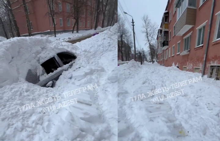В тульском Криволучье снежная лавина с крыши дома засыпала машину