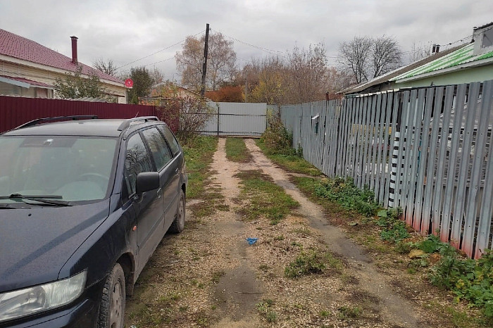 Жительницу Донского соседи замуровали забором