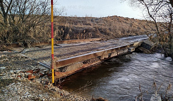 В Кимовском районе от воды освободился мост в деревне Устье